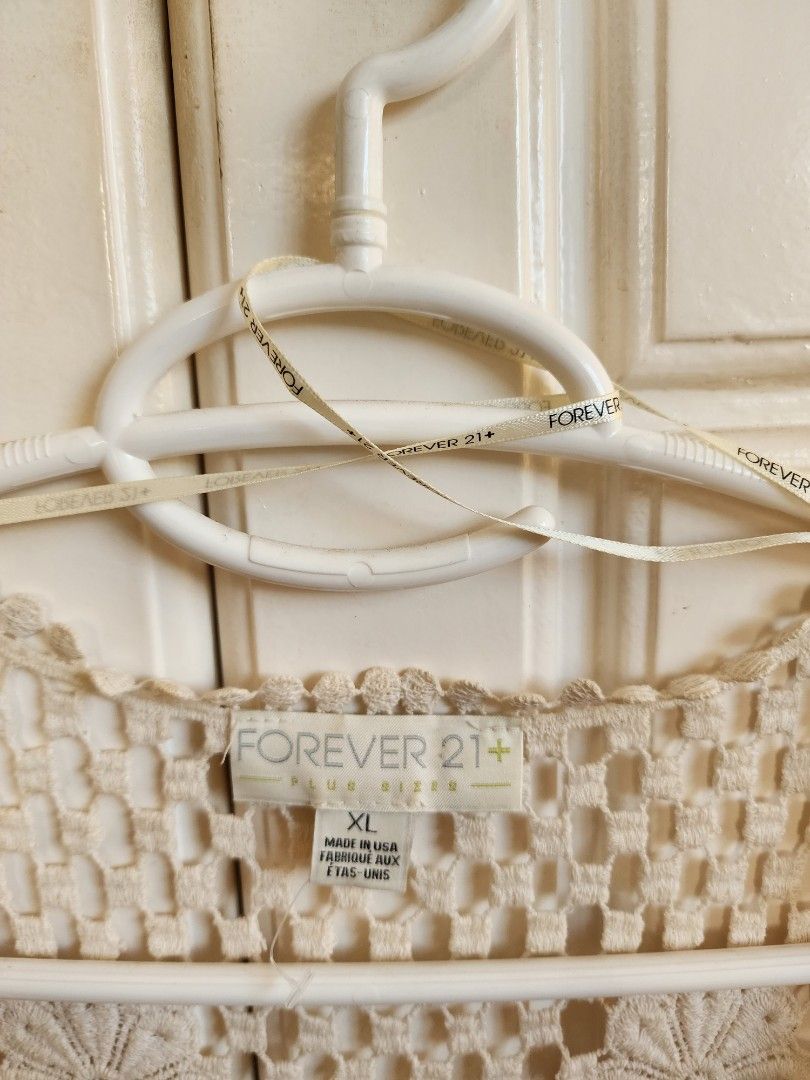 Forever 21 Summer Crochet Vest (Category: Others Tops) located in Paranaque City. Submitted by hannahsrm (Listing ID 1224193119, Image 3). Description: Forever 21 crochet vest ◇ Sleeveless open knit top ◇ Can be used as beach and swimsuit cover-up ◇ Good for layering! Lightweight, makes it summer and heat friendly ◇ Has minor aging stains (see photos) but is barely noticeable when worn! SIZE: XL on tag.