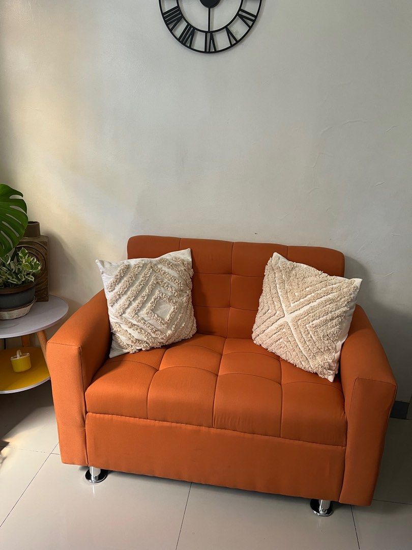 Orange sofa with stool (Category: Sofas) located in Paranaque City. Submitted by abby_e_g (Listing ID 1224222654, Image 3). Description: For Sale: Orange Sofa Chair with matching Stool Set. 8K + SF pm if interested. Thank you!.