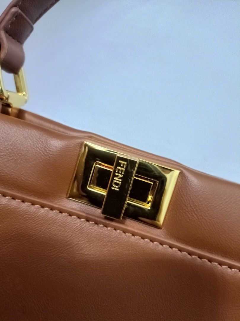 Preloved Fendi peekaboo (Category: Luxury Bags & Wallets) located in Cebu City. Submitted by day.98 (Listing ID 1224146808, Image 2). Description: selected from japan surplus pure leather genuine leather two way bag meduim size with dust bag& cer. card no flaws.