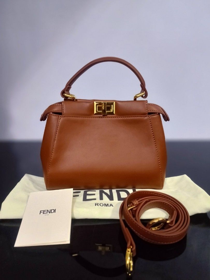 Preloved Fendi peekaboo (Category: Luxury Bags & Wallets) located in Cebu City. Submitted by day.98 (Listing ID 1224146808, Image 1). Description: selected from japan surplus pure leather genuine leather two way bag meduim size with dust bag& cer. card no flaws.