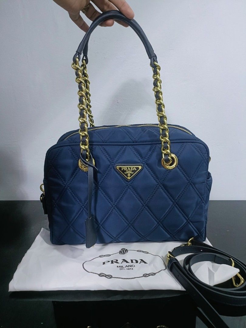 Preloved Prada tesuto (Category: Luxury Bags & Wallets) located in Cebu City. Submitted by day.98 (Listing ID 1224147655, Image 3). Description: selected from japan surplus nailon type dark navy blue color mm size lampo zipped no flaws with dust bag.