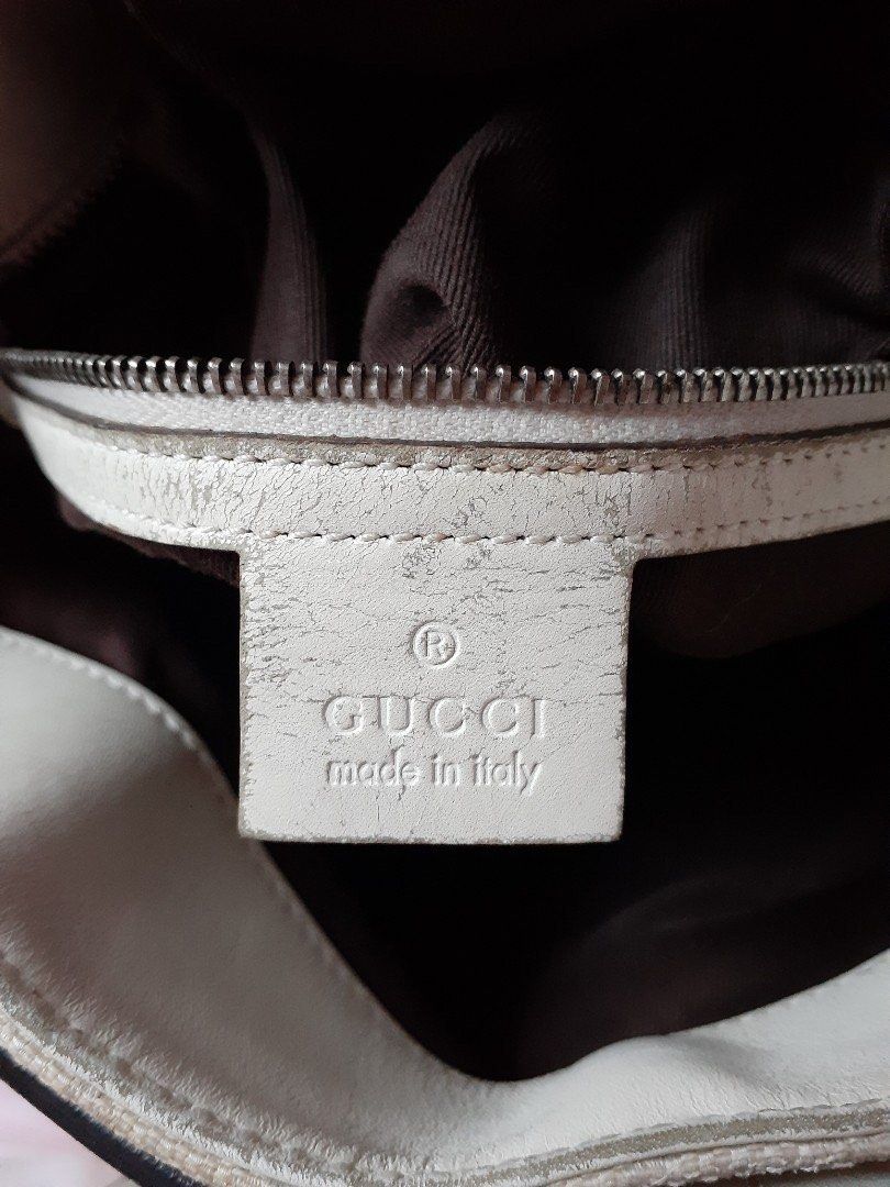 REPRICED- Gucci sling bag (Category: Luxury Bags & Wallets) located in Makati City. Submitted by shemiyu (Listing ID 1009399839, Image 2). Description: Project Bag Sale! Gucci sling bag, with code. with sign of usage , teplaced sling.