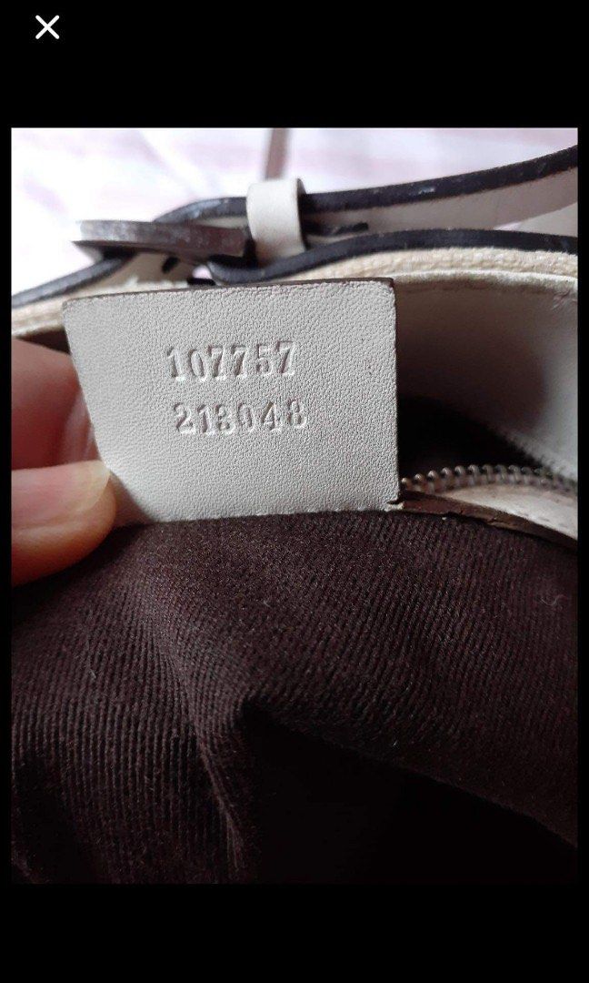 REPRICED- Gucci sling bag (Category: Luxury Bags & Wallets) located in Makati City. Submitted by shemiyu (Listing ID 1009399839, Image 3). Description: Project Bag Sale! Gucci sling bag, with code. with sign of usage , teplaced sling.