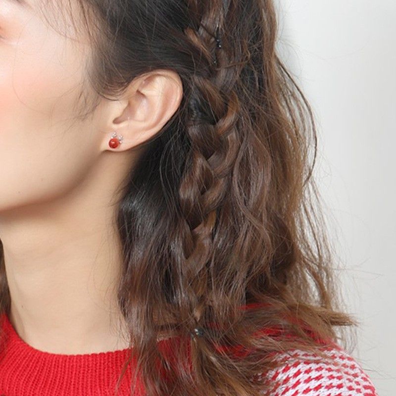Reindeer stud earrings top