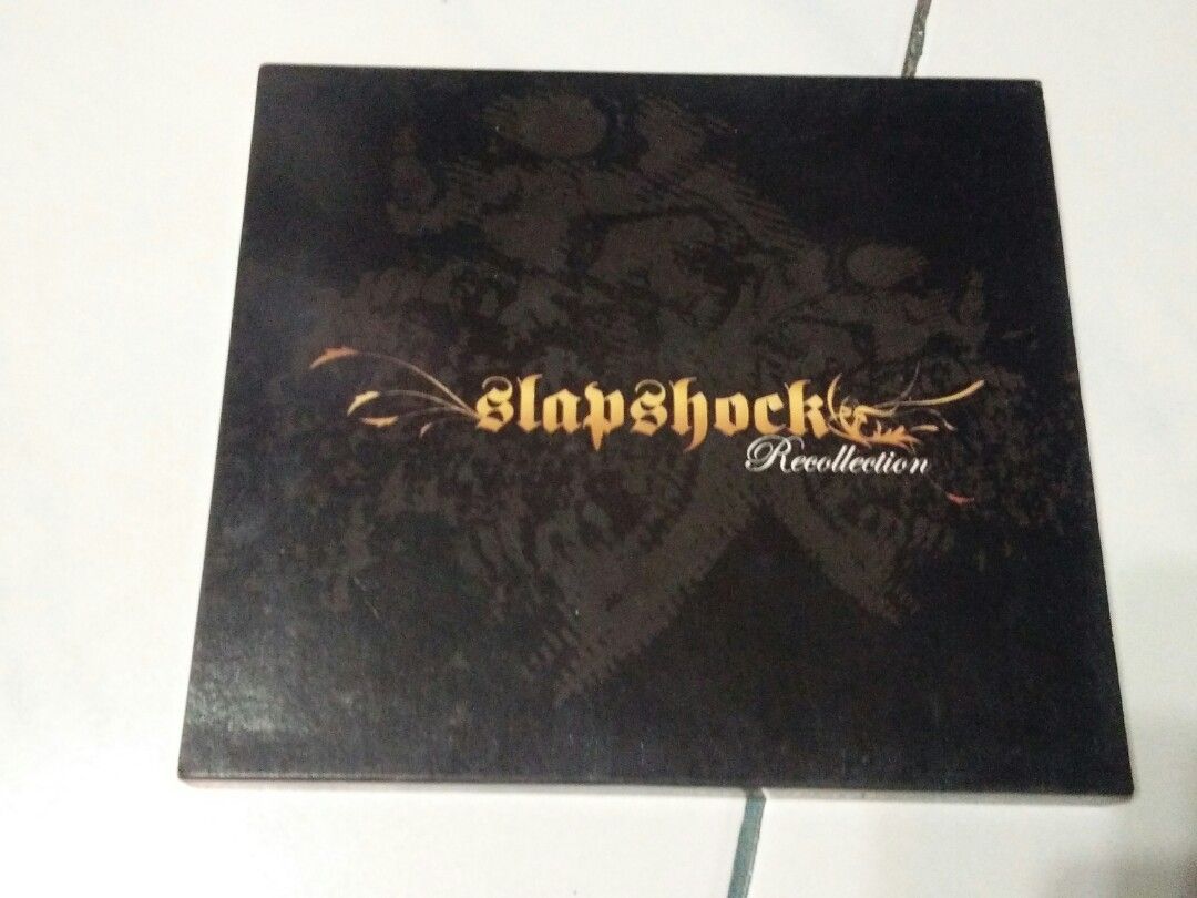 SLAPSHOCK - RECOLLECTION CD + VCD (Category: CDs & DVDs) located in Calamba. Submitted by thekidwholovesvintage (Listing ID 1206508530, Image 2). Description: 🔹SLAPSHOCK - RECOLLECTION CD + VCD 🔹EXCELLENT CONDITION, NO FOLDS ON INLAYS, NO SCRATCHES ON CD 🔹FREE SHIPPING🛵.