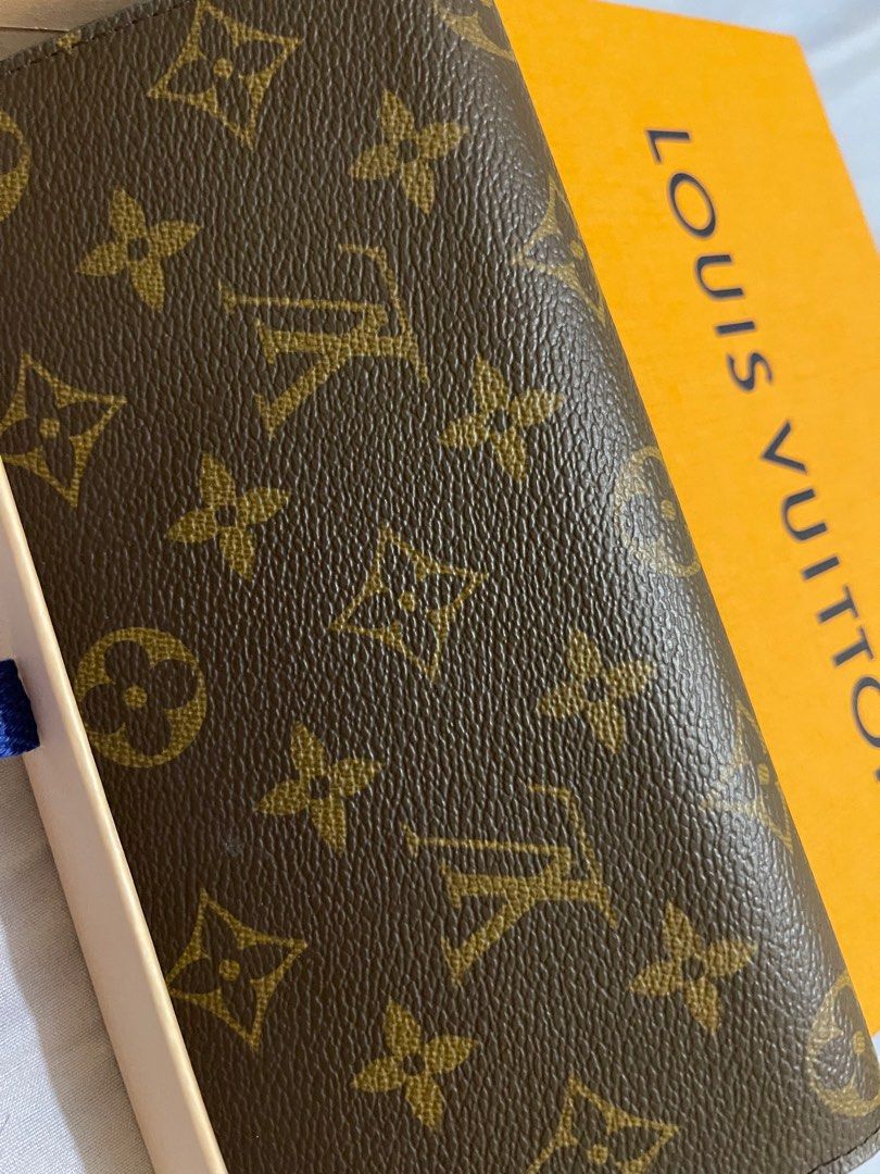 Authentic Louis Vuitton Emilie Wallet with scratch on front flap on