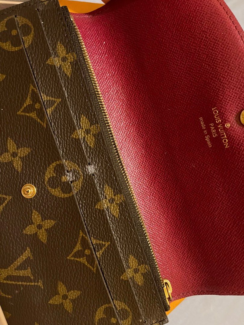 Authentic Louis Vuitton Emilie Wallet with scratch on front flap on