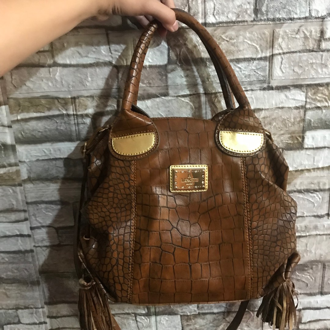 Dissona leather bag, Women's Fashion, Bags & Wallets, Purses & Pouches on  Carousell