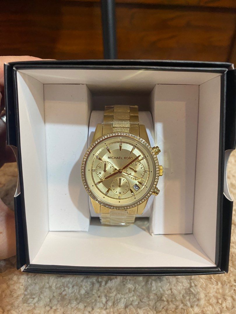 MICHAEL KORS GOLD WATCH on Carousell