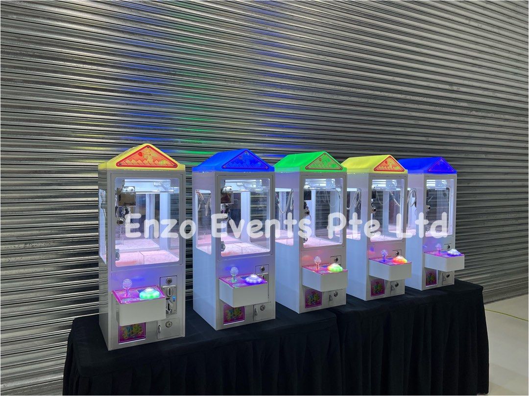 Mini Claw Machine Rental / Fun Sized Claw Machine / Claw Machine / Toy Catcher / Claw Machine Rental / Arcade Machine / Magic Show / Balloon Sculpting / Birthday Events / Bouncy Castle / Party Package / BackDrop / Kids Birthday Party (Category: Event & Party Services) located in Singapore. Submitted by enzoevents (Listing ID 1227642828, Image 1). Description: Mini Claw Machine Rental rate: 🔥🔥🔥🔥 PROMOTION PERIOD 🔥🔥🔥🔥 ✅✅✅✅ 1 July - 31 July 
