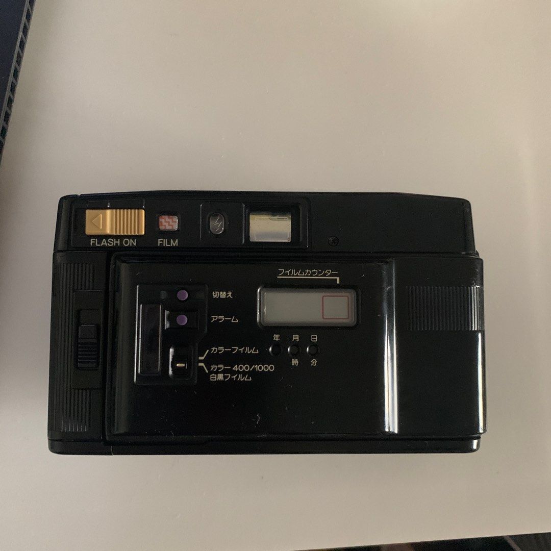 Minolta film camera, Photography, Cameras on Carousell