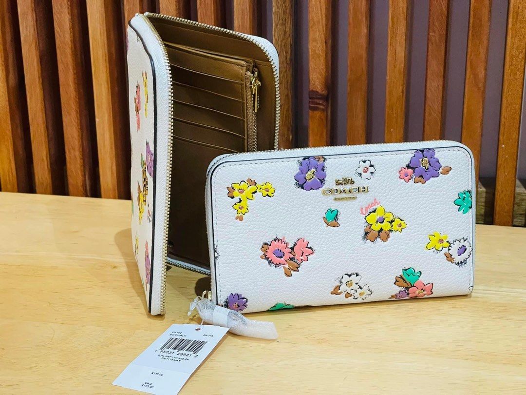 💯ORIGINAL COACH FLORAL MEDIUM ZIP WALLET RETAIL (Category: Luxury Bags & Wallets) located in Quezon City. Submitted by ashongsstore (Listing ID 1227638934, Image 1). Description: 🐎C0AÇH COLLECTION 🐎 🇵🇭ONHAND🇵🇭 Snap Wallets ‼️Please look at our pictures as that is exactly what you are purchasing‼️ 💯GUARANTEED ORIGINAL AND AUTHENTIC or TRIPLE YOUR MONEY BACK! Not REPLICA, OEM, TOP GRADE QUALITY, AUTHENTIC QUALITY or Any other Terms to DENOT