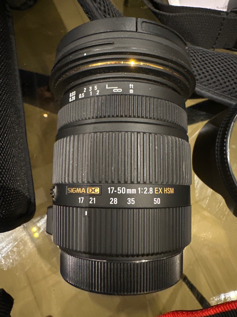 Selling Sigma lens 1750mm f2.8 with dry and free gifts