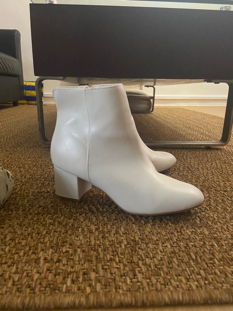 white heeled boots