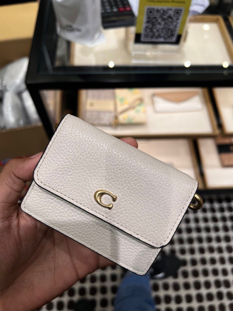 Polished pebble leather coach deals