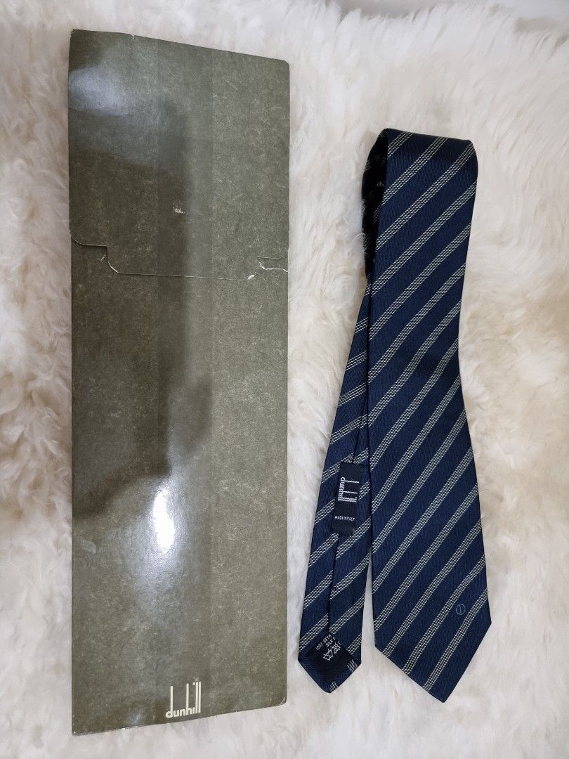 Dunhill Necktie (Category: Luxury Accessories) located in Binangonan. Submitted by caaaris (Listing ID 1227866341, Image 1). Description: Dunhill Necktie Authentic Never-worn with tag 100 % Seta Soie Sil Seide Dry Clean Only Size 8.4 cm Made in Italy.