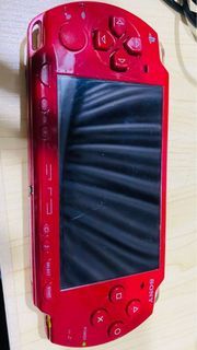 Faulty PSP 2006 red. For parts.