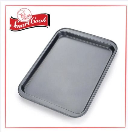 Non-Stick cookie sheet tray (Category: Bakeware) located in Quezon City. Submitted by trustrade86136 (Listing ID 1227817158, Image 2). Description: "Easy to Clean Stain and Rust Resistant Strong and Durable BPA-Free Oven Safe Multi-Purpose High-Quality Extremely Versatile and Perfect for Everyday Use Simple to Use" Size: 27cm x 38cm x2cm.