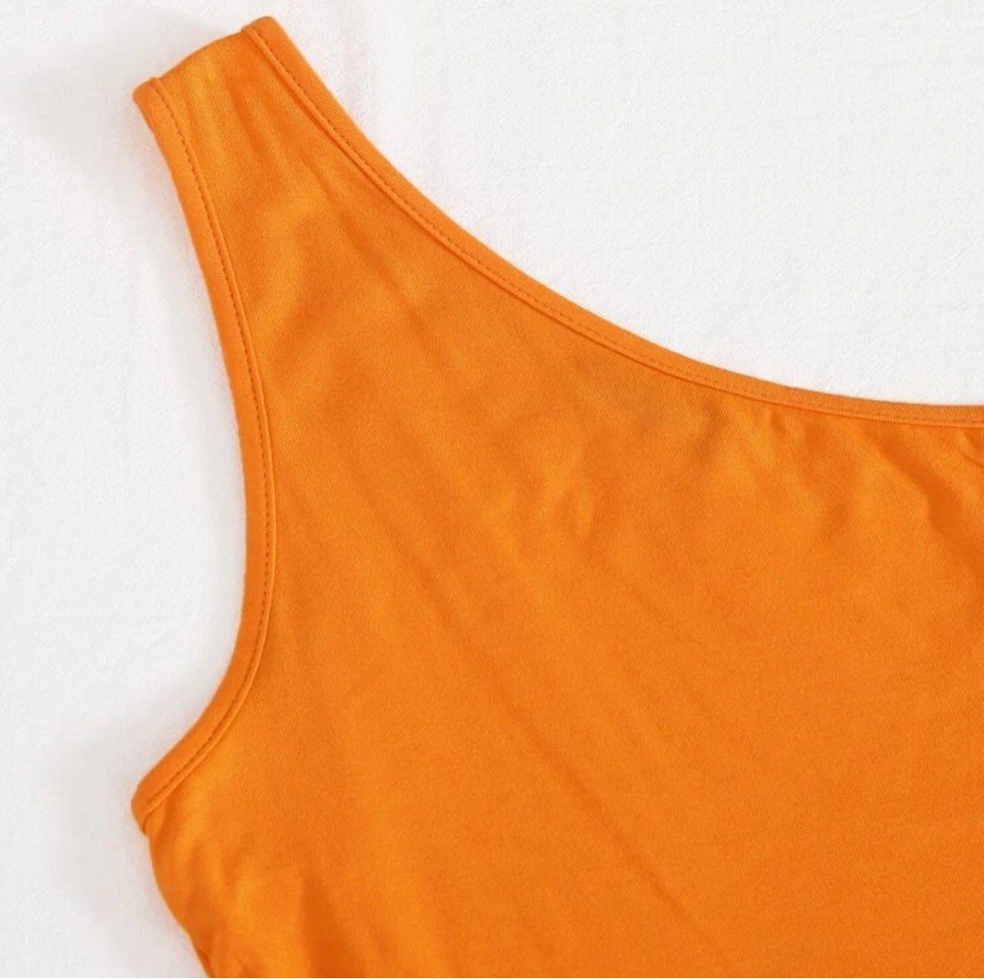 ONE SHOULDER TOP WITH BLACK CARGO PANTS (Category: Sets or Coordinates) located in Paranaque City. Submitted by only.cece (Listing ID 1227823393, Image 3). Description: ✅ Orange one shoulder top & Cargo pants ✅ ORIGINALLY Php 1,114 on Shein. Good price na po ito for both! :) ✅ USED ONLY ONCE in Dubai ✅ NO DAMAGES, NO FLAWS ✅ CARGO PANTS - Garterized ☑️ Size LARGE (both top and cargo pants) ⭕️ RFS : Not my style anymore ⭕️MOP : BPI TRANSFER/GCASH.