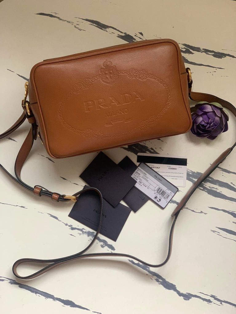 Prada embossed camera bag Clearance
