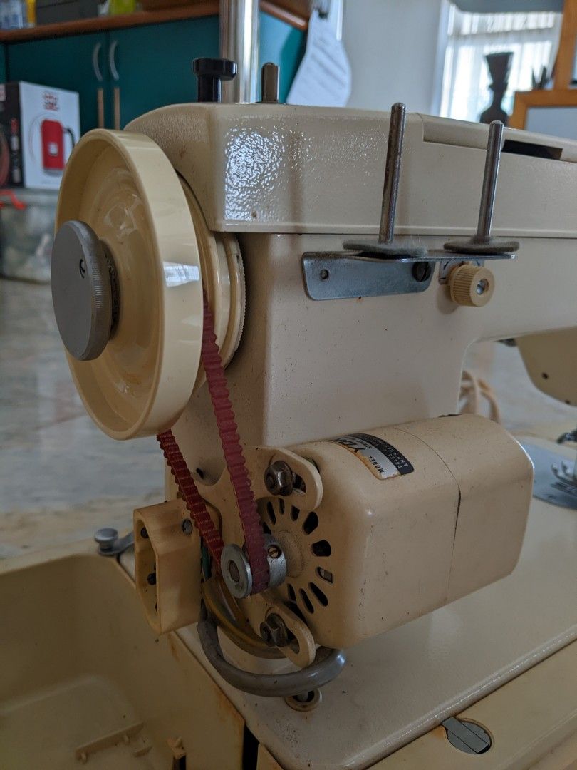 Toyota Sewing Machine with YDK sewing Motor and accessory box, TV