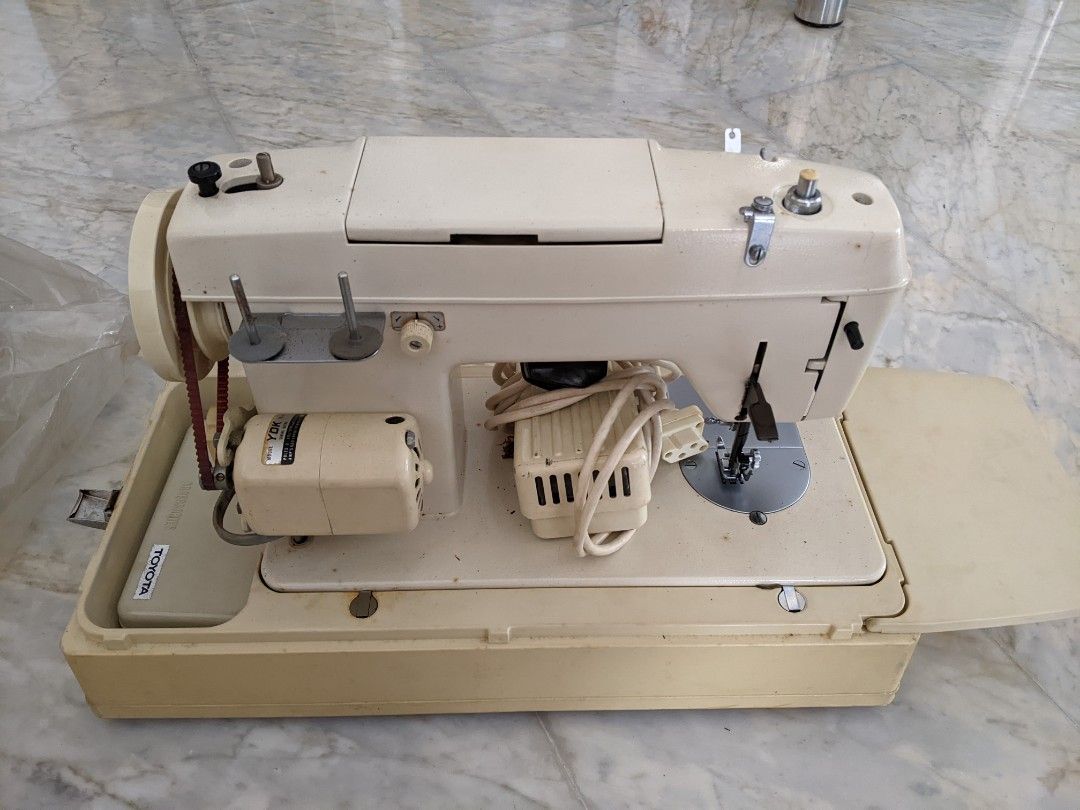 Toyota Sewing Machine with YDK sewing Motor and accessory box, TV