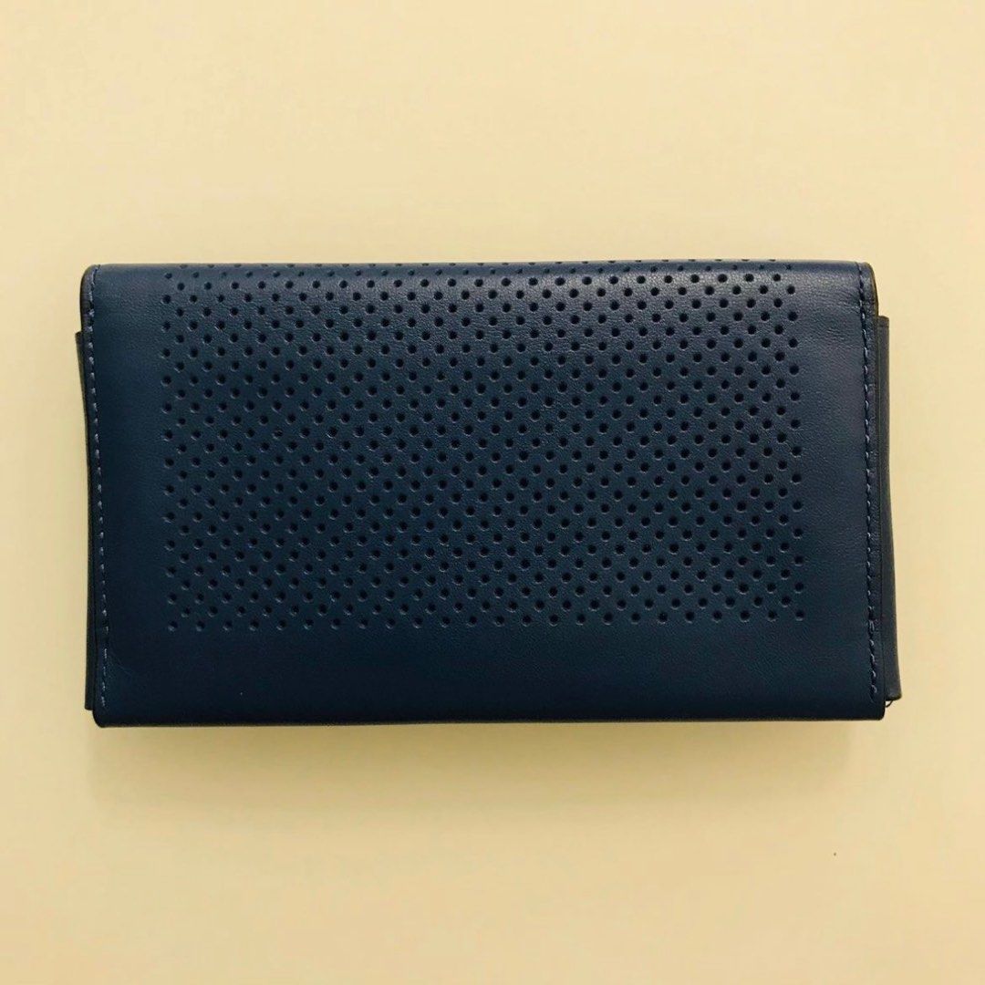UNIVERSAL PHONE CASE IN PERFORATED LEATHER COACH F65204 Men s Fashion Bags Wallets on Carousell