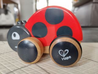Used Hape pull-along ladybug toy