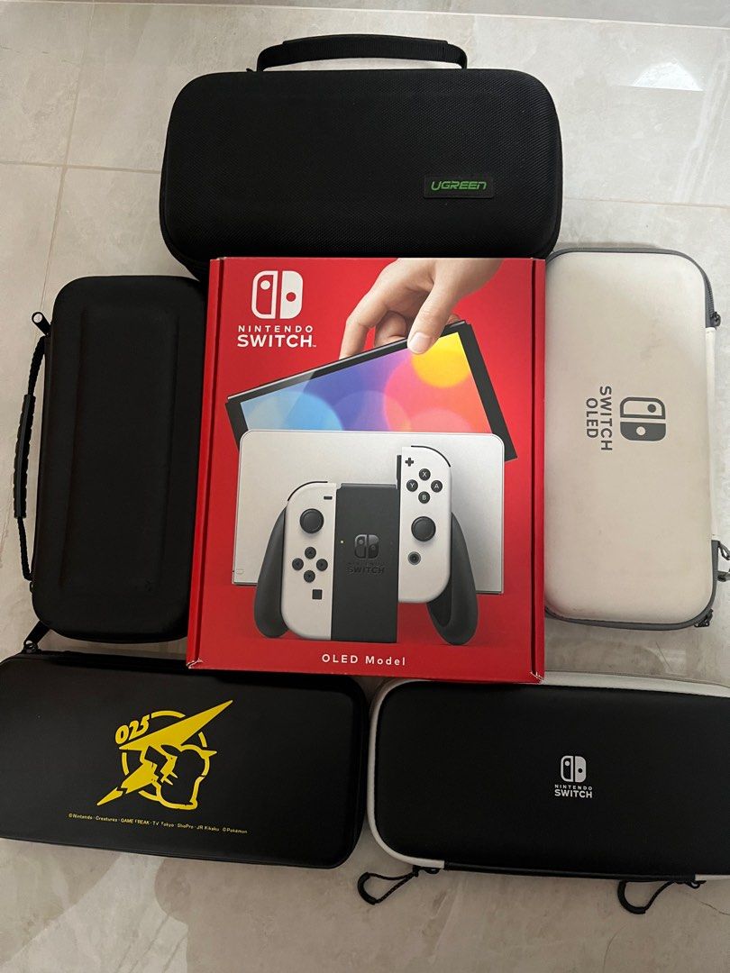 Warranty + free pouch Nintendo Switch OLED, Video Gaming, Video Game