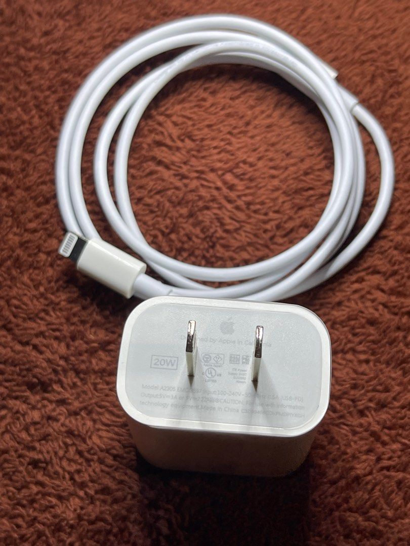 20Watts iPhone charger (Category: Chargers & Cables) located in Manila. Submitted by minecessories (Listing ID 1228048394, Image 2). Description: For sale Apple charger 20Watts adaptor Type to lightning cord No issue.