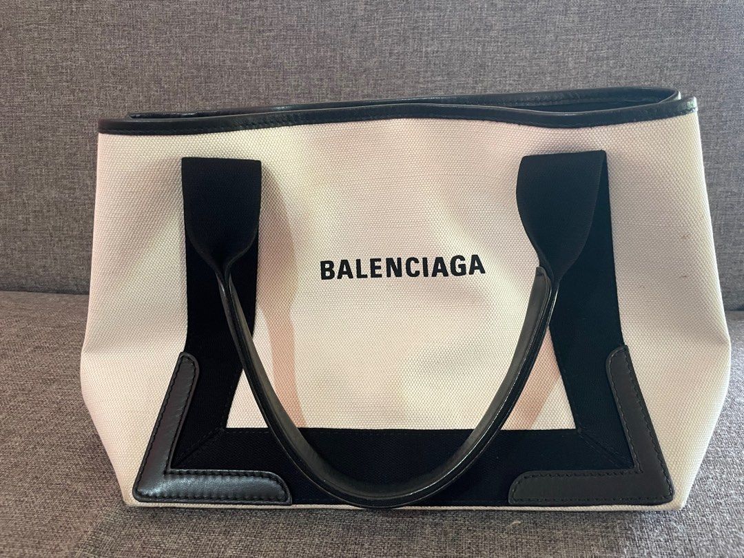 Authentic Balenciaga Small Navy Cabas Bag (Category: Luxury Bags & Wallets) located in Makati City. Submitted by shopping.acct18_ (Listing ID 1227909791, Image 1). Description: Balenciaga Navy Cabas Bag Small size Authentic Japan bought, please see receipt No haggling!.