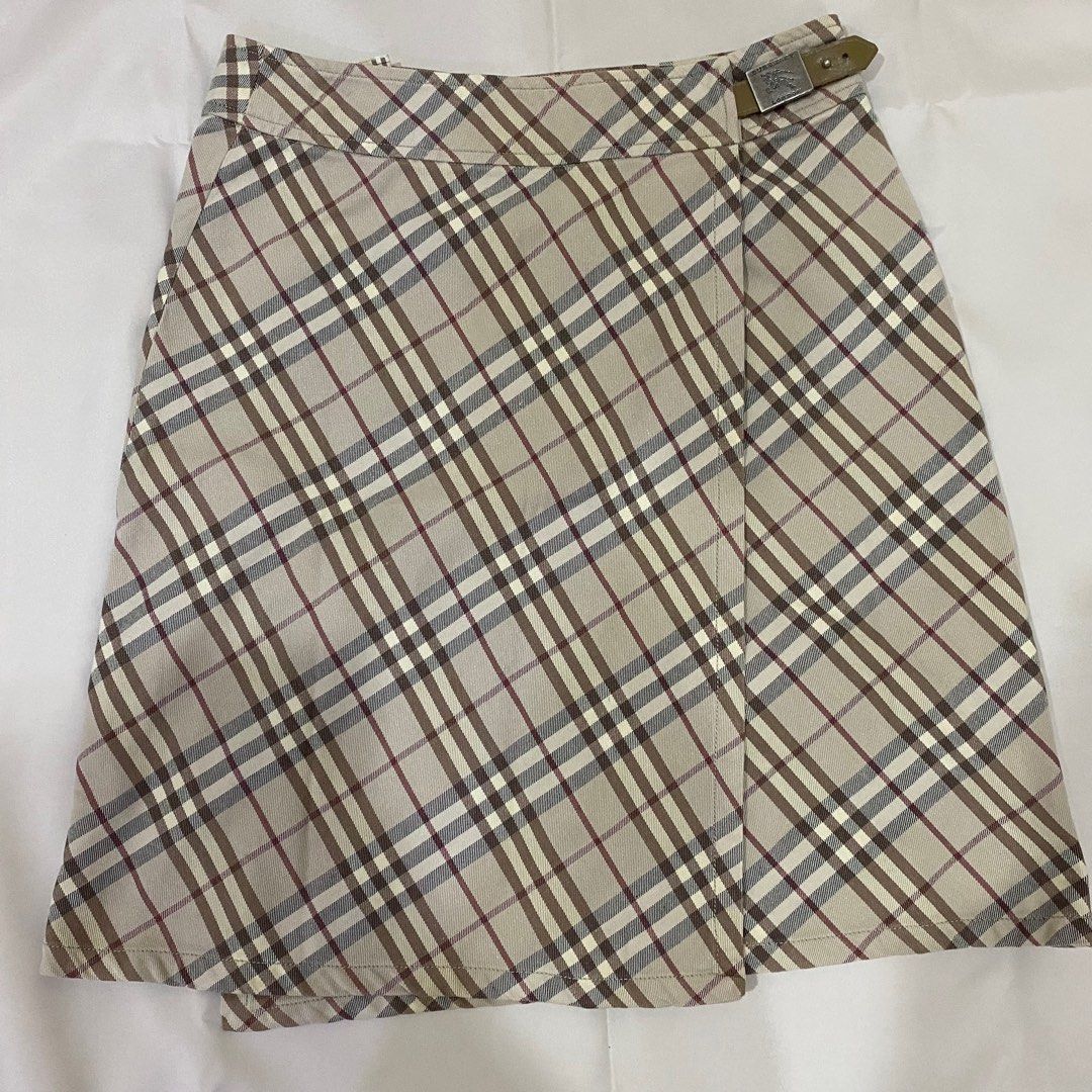Authentic Burberry Skirt Nova Plaid (Category: Skirts) located in Manila. Submitted by ashantilaneeeee (Listing ID 1228030386, Image 1). Description: Authentic Burberry Nova Plaid Skirt Made in Hongkong Waist: 27 - 28 inches (m) Length: 19.5 inches.