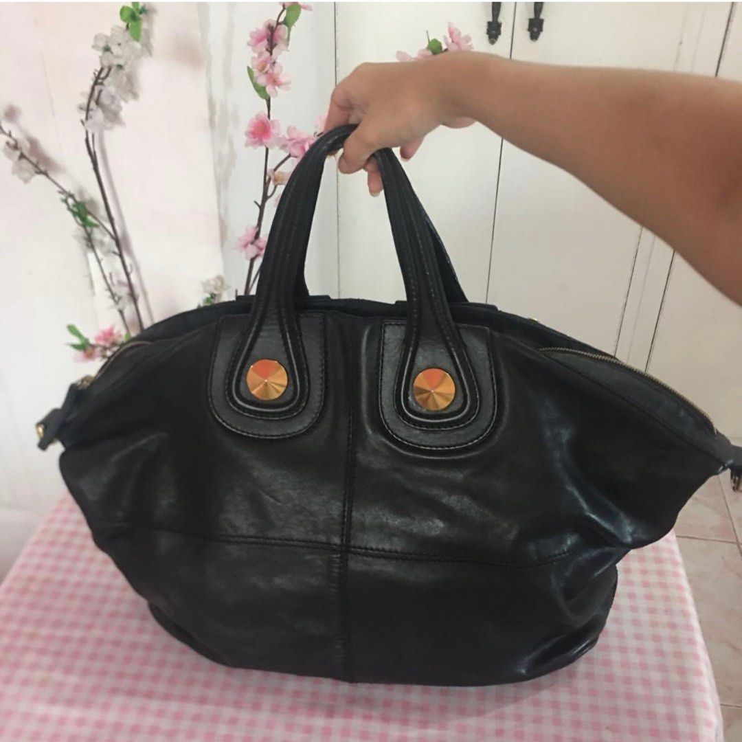Authentic Givenchy Large Nightingale Bag (open for layaway) (Category: Luxury Bags & Wallets) located in Rizal. Submitted by SummerPeaCloset (Listing ID 1228039336, Image 2). Description: Price Drop 👉🏻👉🏻👉🏻Authentic Limited Edition Given chy Nightingale Large Studded Bag Authentic Given chy Nightingale Studded Large Bag Limited edition With signs of use on the side but without any hold or major rub Only PHP 29,800 Discounted from PHP 36,000 