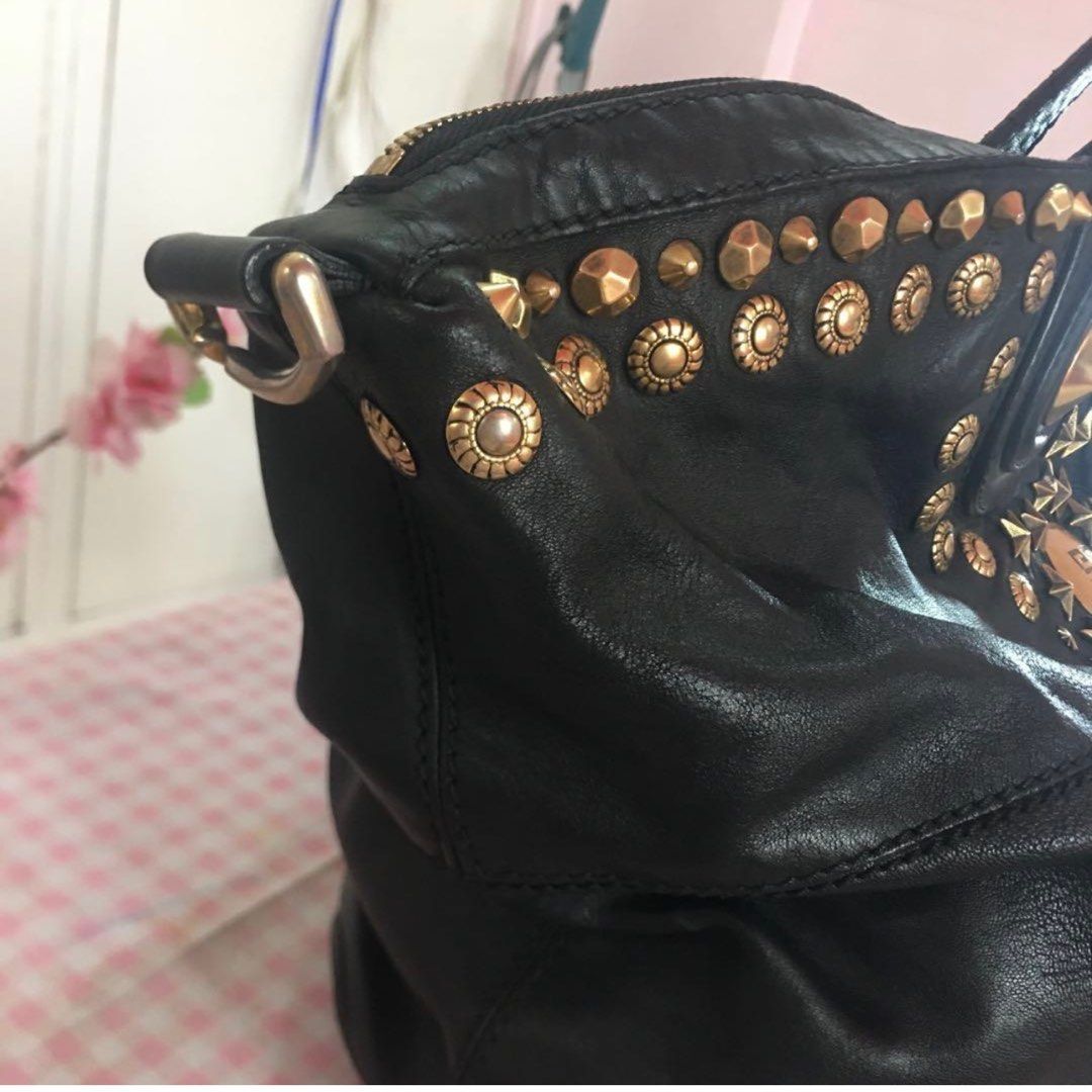 Authentic Givenchy Large Nightingale Bag (open for layaway) (Category: Luxury Bags & Wallets) located in Rizal. Submitted by SummerPeaCloset (Listing ID 1228039336, Image 3). Description: Price Drop 👉🏻👉🏻👉🏻Authentic Limited Edition Given chy Nightingale Large Studded Bag Authentic Given chy Nightingale Studded Large Bag Limited edition With signs of use on the side but without any hold or major rub Only PHP 29,800 Discounted from PHP 36,000 