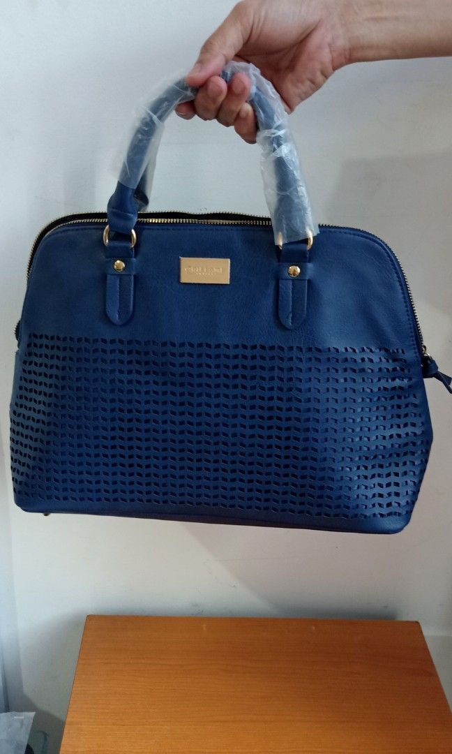 Royal navy handbag 2025 oriflame