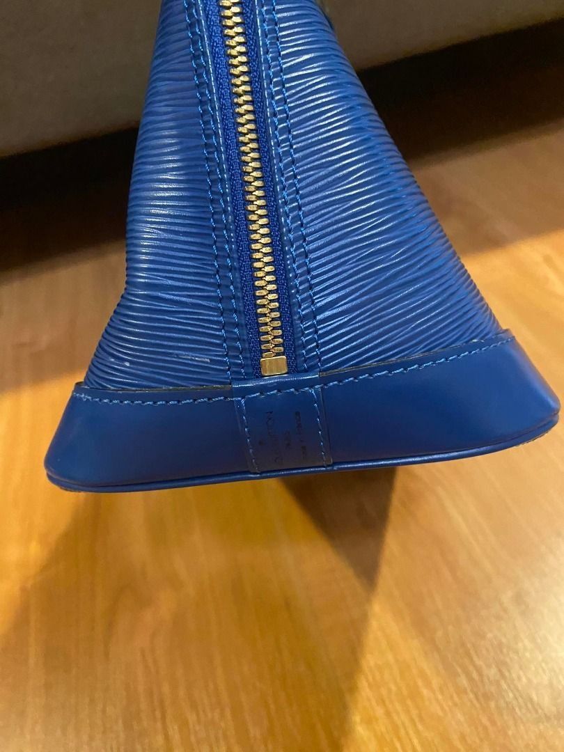 Louis Vuitton Alma Epi Blue Bag (Category: Luxury Bags & Wallets) located in Mandaluyong City. Submitted by peanutsola (Listing ID 1227960911, Image 3). Description: Still in excellent condition as seen on photo. No damage/defects whatsoever. Well taken care of. Can be viewed personally in our store before purchase, just msg us ahead of time:) 32 x 25 x 16 cm (Length x height x width ).