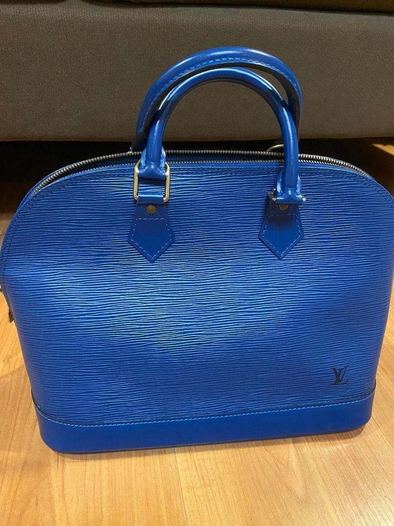 Louis Vuitton Alma Epi Blue Bag (Category: Luxury Bags & Wallets) located in Mandaluyong City. Submitted by peanutsola (Listing ID 1227960911, Image 1). Description: Still in excellent condition as seen on photo. No damage/defects whatsoever. Well taken care of. Can be viewed personally in our store before purchase, just msg us ahead of time:) 32 x 25 x 16 cm (Length x height x width ).
