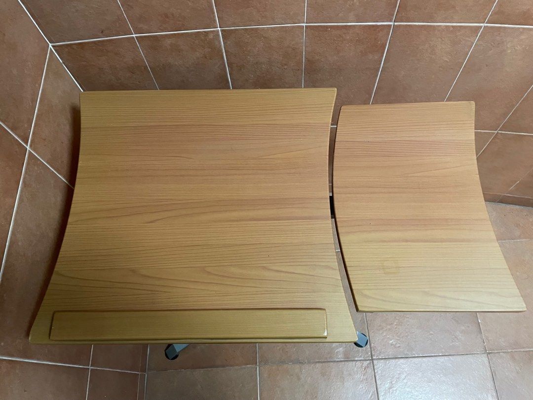 Small table (Category: Tables & Sets) located in Singapore. Submitted by kjialing (Listing ID 1228018789, Image 2). Description: Small table, about 74cm (l) x 45cm (w) x 69cm (h). The height is adjustable, but the knob below is difficult to adjust. (A wrench or other tool might help.) Still in good condition otherwise. Collect from my house only..