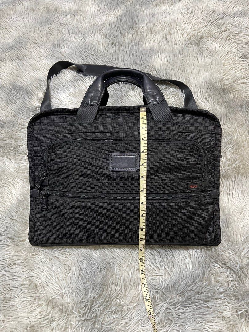 Tumi slim online deluxe portfolio leather