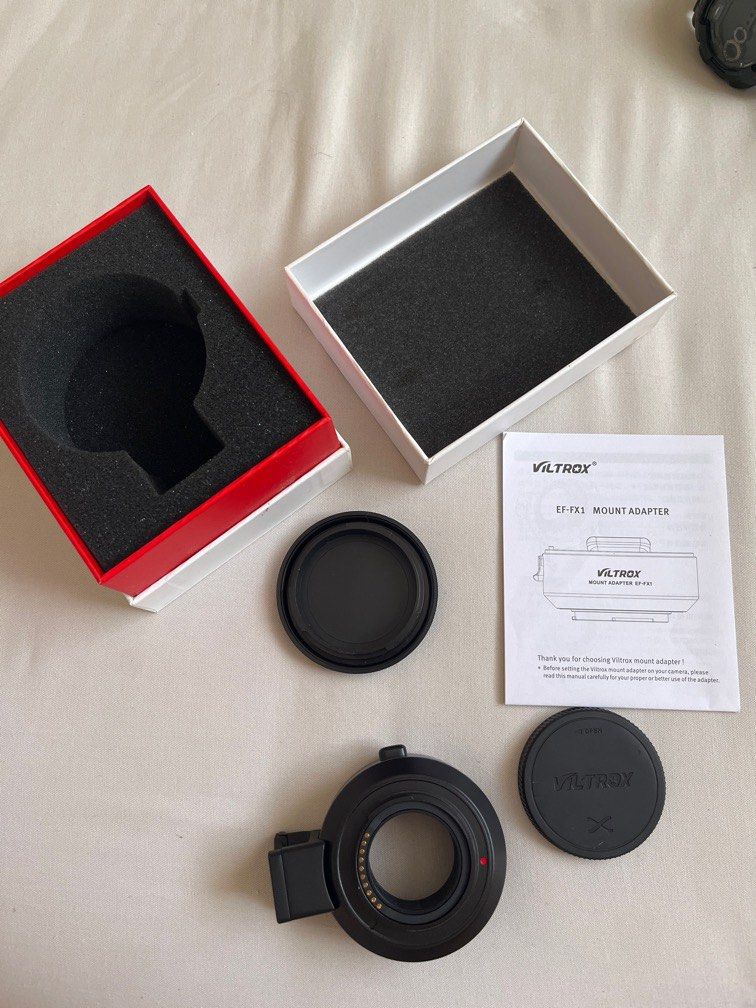 Viltrox mount adapter for fuji-X mount (Category: Lens & Kits) located in Cebu City. Submitted by bkaye22 (Listing ID 1227909868, Image 2). Description: Voltrox EF-FX1 Specs Compatible lenses-Canon EF/EF-S series lenses Compatible camera- Fuji X-Mount mirrorless focus mode : Auto focus tripod socket : Cu1/4” x 1 Firmware upgrade: USB upgrade port Diameter & Length : 67mm x 31mm Weight: Aprprox. 142g Front cap : Camera cover Rear cap: Lens dust ca