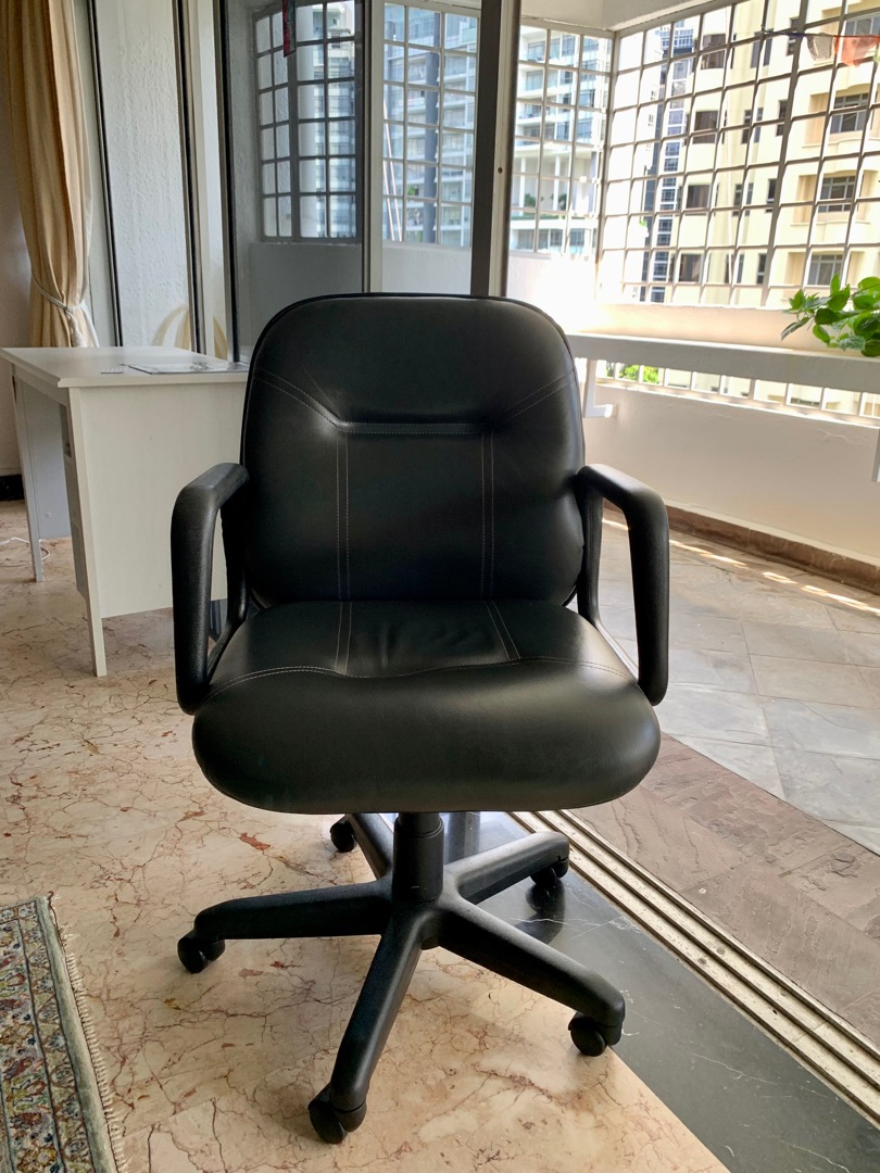 2 soft black leather office swivel chairs with adjustable height lever