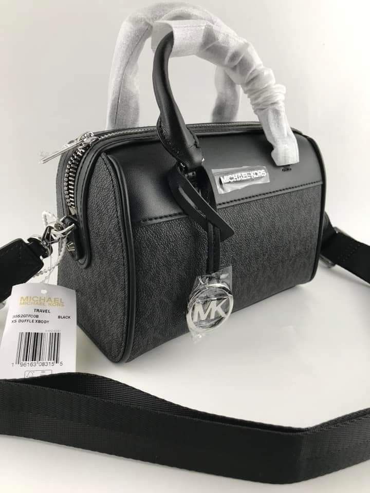 🍀 MK XS Duffle ( Black & White) (Category: Luxury Bags & Wallets) located in Manila. Submitted by shan_kenz (Listing ID 1228223715, Image 2). Description: 🍀 MK XS Duffle ▪️ 7.5 (L) x 6"(H) x 4"(D) 💰 P2,400 ▪️Actual photo ▪️Plus SF.