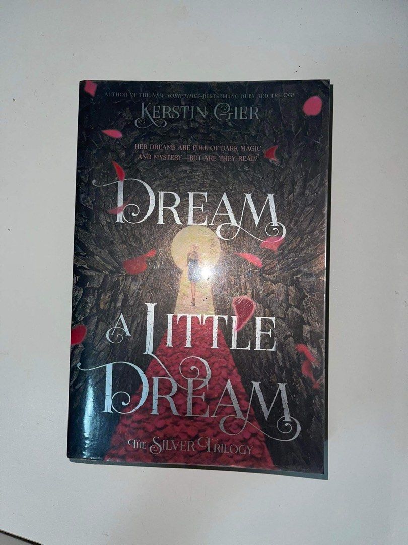 DREAM A LITTLE DREAM BY KERSTIN GIER (Category: Storybooks) located in Leyte. Submitted by dey_shell (Listing ID 1228144607, Image 1). Description: Pre-loved, never been read, yellow stains on first pages, covered with acetate.