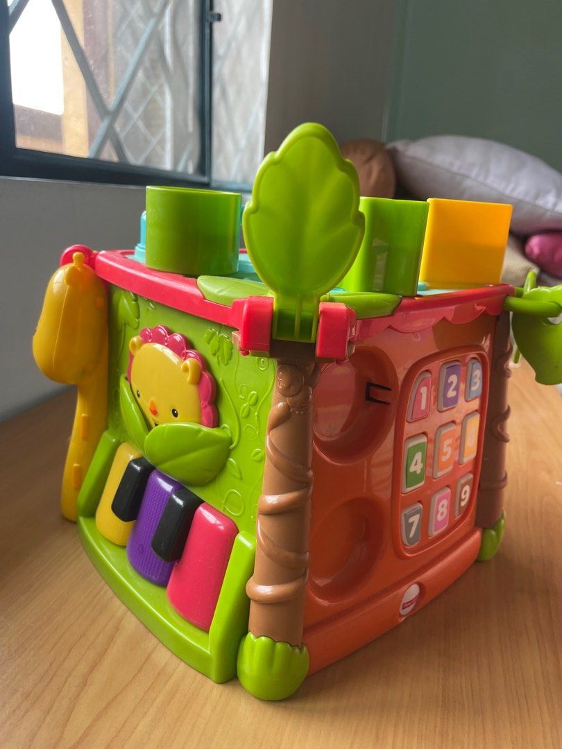 Fisher Price activity block (with sounds) (Category: Infant Playtime) located in Paranaque City. Submitted by moedancing (Listing ID 1228074348, Image 2). Description: Very nice and interactive for infants Only missing a telephone toy but everything else is intact..