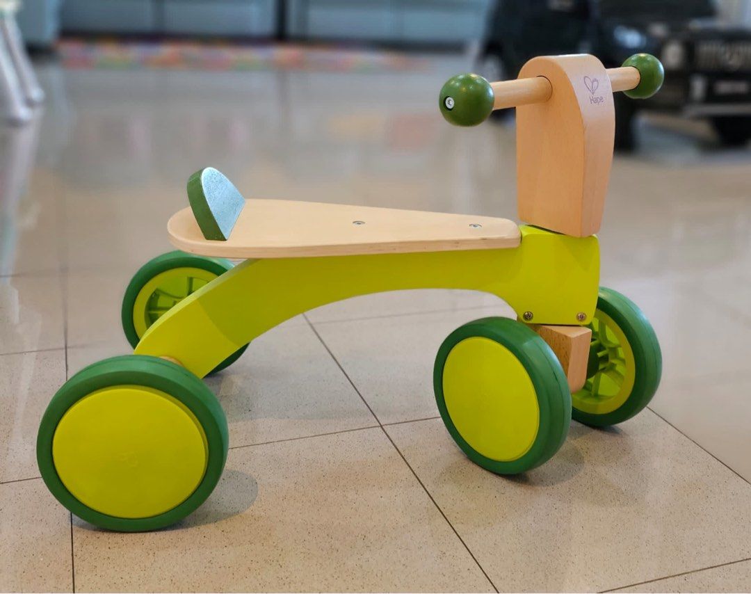 Hape scoot around ride store on wood bike