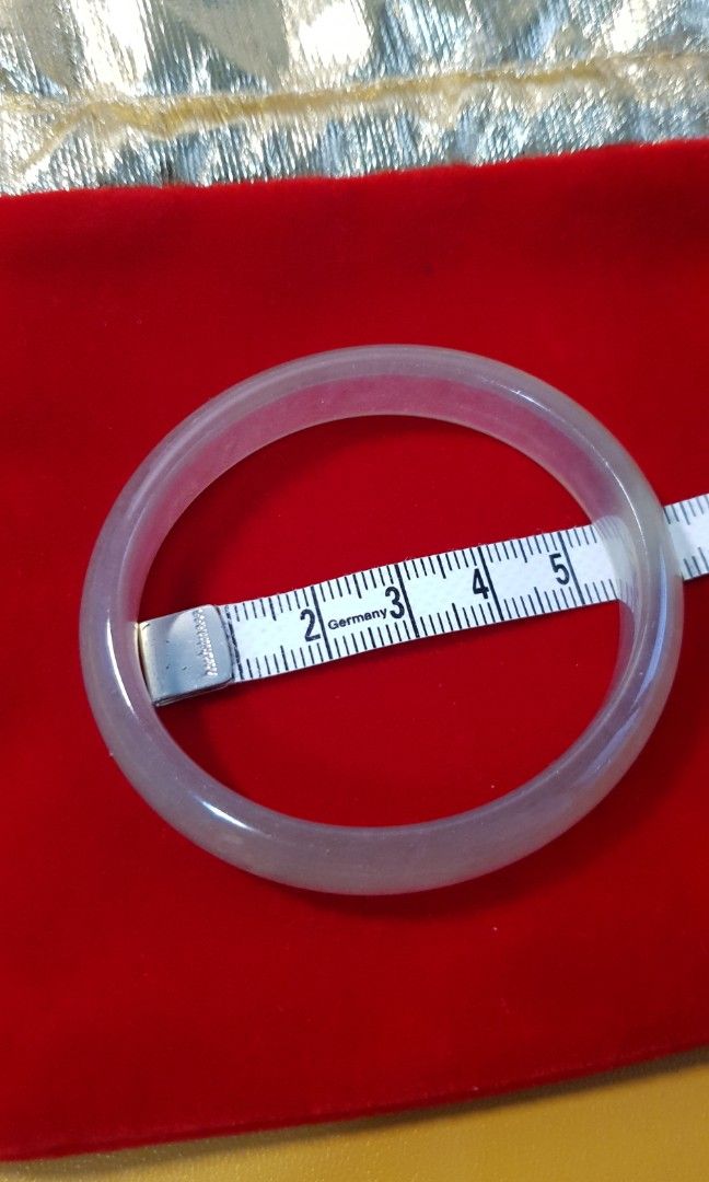 Jade bangle (Category: Bracelets) located in Singapore. Submitted by sweetsharestop (Listing ID 1228136174, Image 3). Description: Oval shape jade bangle from China. Unique grey purplish color. Comes with certificate proven authentic product..