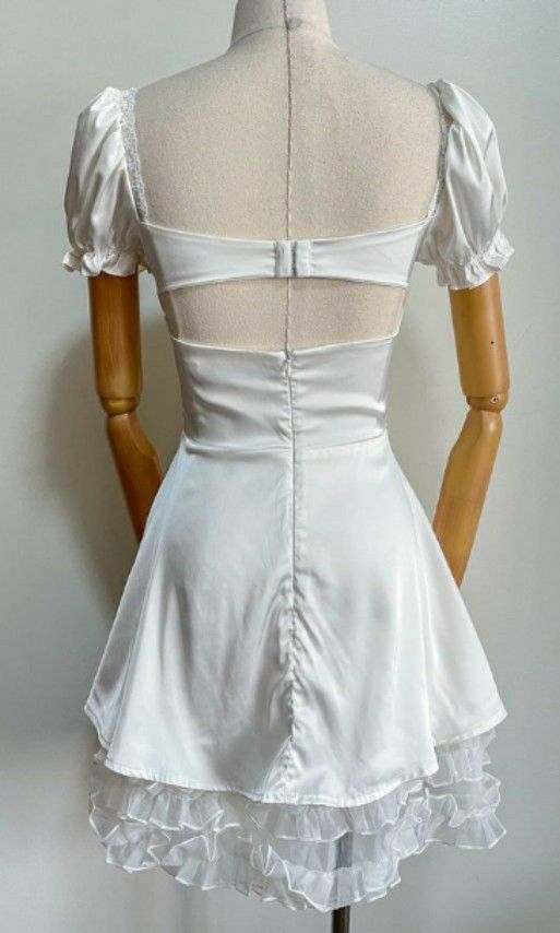 LOOKING FOR!! WHITE OPEN BACK DRESS (Category: Dresses) located in Taguig. Submitted by declutter_anon (Listing ID 1228123783, Image 2). Description: LOOKING FOR DRESS EXACTLY LIKE THE ONE IN THE PICTURE XS-S.