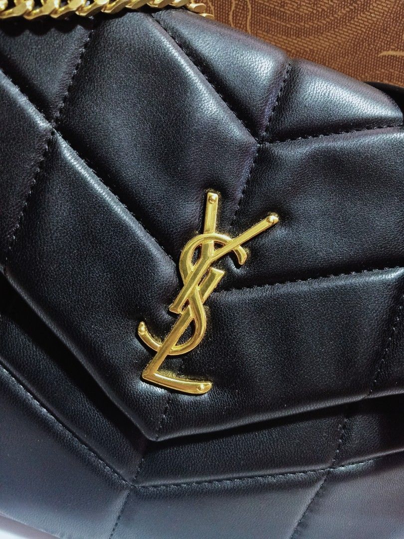 Preloved YSL pufferd leather (Category: Luxury Bags & Wallets) located in Cebu City. Submitted by day.98 (Listing ID 1228213313, Image 2). Description: selected from japan surplus genuine leather coded no flaws meduim size.