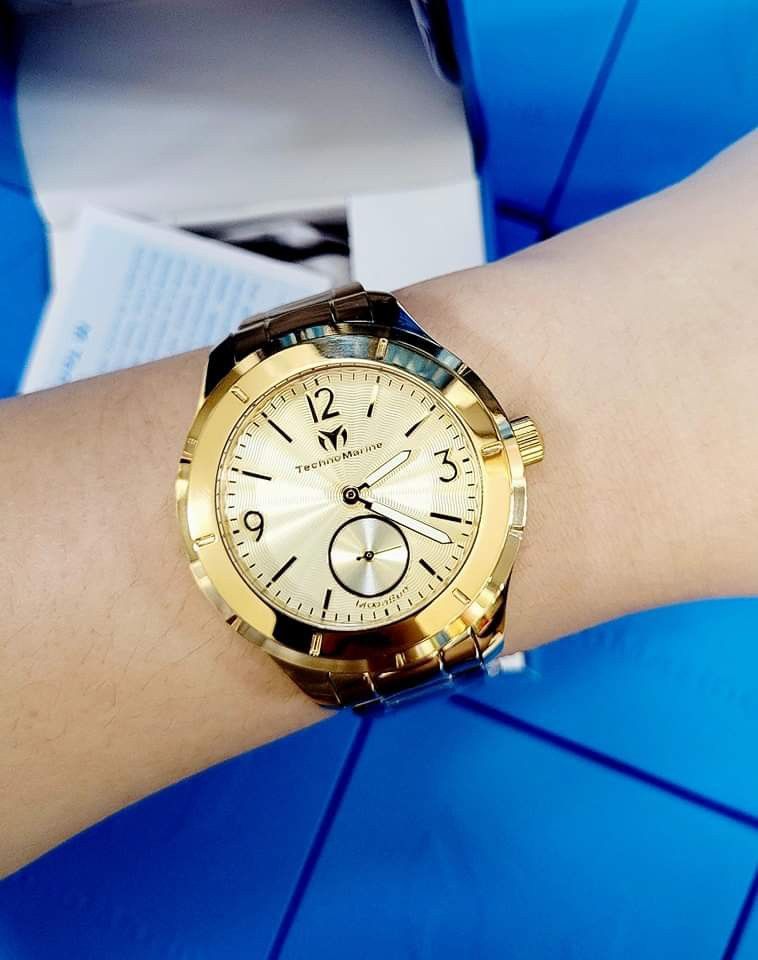 TechnoMarine MoonSun TM719030 Watch (Category: Women's Watches) located in Manila. Submitted by annafinds (Listing ID 1228217971, Image 1). Description: ORIGINAL/AUTHENTIC US BOUGHT MONEYBACK GUARANTEED IF PROVEN FAKE Case and Dial Case Size: 42mm Case Material: Stainless Steel Bezel Material: Stainless Steel Bezel Color: Gold Crown Type: Push Crystal Type: Flame Fusion Dial Material: Metal Movement Caliber: VD78 Function Type: Quartz Water Resis