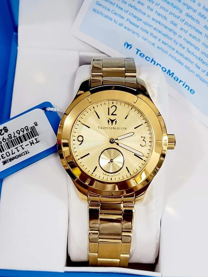 TechnoMarine MoonSun TM719030 Watch (Category: Women's Watches) located in Manila. Submitted by annafinds (Listing ID 1228217971, Image 2). Description: ORIGINAL/AUTHENTIC US BOUGHT MONEYBACK GUARANTEED IF PROVEN FAKE Case and Dial Case Size: 42mm Case Material: Stainless Steel Bezel Material: Stainless Steel Bezel Color: Gold Crown Type: Push Crystal Type: Flame Fusion Dial Material: Metal Movement Caliber: VD78 Function Type: Quartz Water Resis